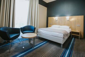 Фото номера Улучшенный двухместный номер с 1 кроватью Отель Hotel Radocza Park Business г. Radocza 2